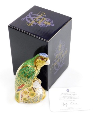 A Royal Crown Derby porcelain Amazon Green Parrot paperweight, limited edition no. 1454/2500, gold stopper and red printed marks, 16cm high, boxed with certificate.