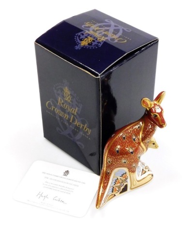 A Royal Crown Derby porcelain Kangaroo paperweight, part of The Australian Collection and one of a signature edition limited to availability until the end of 2000, gold stopper and gold printed marks, 15cm high, boxed.