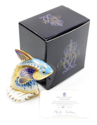 A Royal Crown Derby porcelain Guppy Fish paperweight, limited edition no. 46/2500, gold stopper and red printed marks, 13cm high, boxed with certificate.