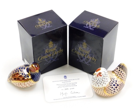 Two Royal Crown Derby porcelain paperweights, comprising Chicken, gold stopper and red printed marks, 8cm high, and Partridge, limited edition no. 285/4500, gold stopper and red printed marks, 7cm high, both boxed, partridge with certificate. (2)