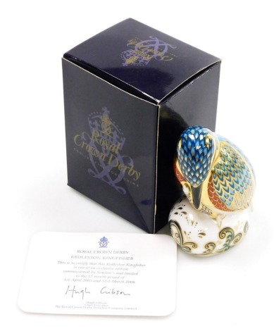 A Royal Crown Derby porcelain Kedleston Kingfisher paperweight, one of an exclusive edition commissioned by Sinclairs and limited to a twelve month period of 1st April 2005 and 31st March 2006, designed by John Ablitt, gold star and red printed marks, 12c