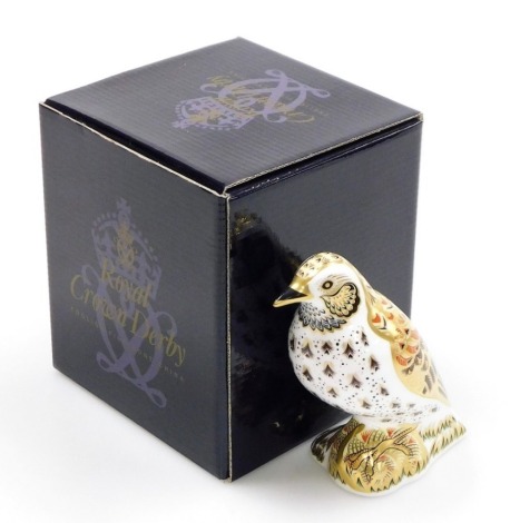 A Royal Crown Derby porcelain Song Thrush paperweight, gold stopper and red printed marks, 11cm high, boxed.