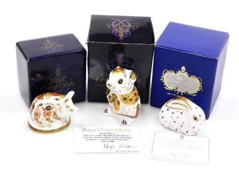 Three Royal Crown Derby porcelain paperweights, comprising Field Mouse, produced exclusively for Sinclairs, limited edition no. 298/1000, gold stopper and red printed marks, 8cm high, boxed with certificate, Imari Piglet, silver stopper and red printed ma