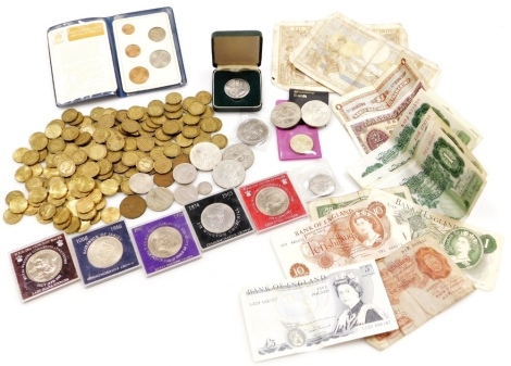 Coins and bank notes, including commemorative crowns, DHF Somerset five pound note, seven LK O'Brien one pound notes and three ten shilling notes. (a quantity)