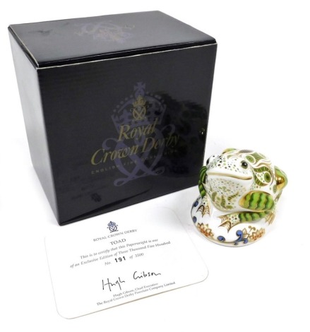 A Royal Crown Derby porcelain Toad paperweight, designed by Sue Rowe 2007, limited edition no. 191/3500, gold stopper and red printed marks, 7cm high, boxed with certificate.