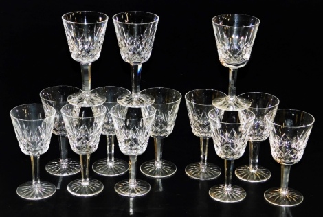 A set of thirteen Waterford Lismore wine glasses, 15cm high, some marked Waterford.