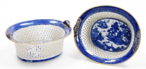 A pair of Chinese Qianlong blue and white chestnut baskets, decorated in underglaze blue with pagodas and gilt highlights, 21.5cm wide. (AF)