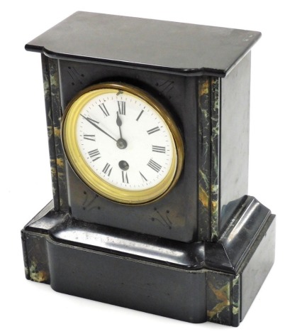 A Victorian black slate and marble mantel clock, with white ceramic dial bearing Roman numerals, thirty hour movement, 23cm high.