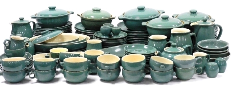 An extensive Denby Manor Green pottery tea and dinner service, to include tureens, dinner plates, teapots, two handled soup bowls, milk jugs, egg cups, etc. (a quantity)