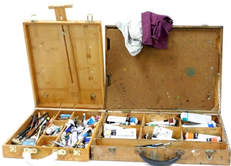 A group of artist's materials, to include a wooden case enclosing various acrylic paints, paintbrushes, pallet knife, fine texture gel for acrylics, and a table top easel, the interior containing water mixable oil colours, paintbrushes, thinner, etc.