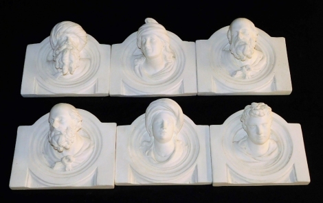 A group of six plaster wall mounted busts, of classical figures, 19cm wide.