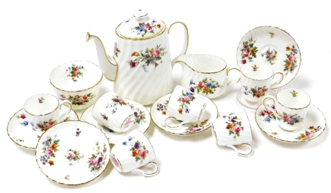 A Mintons porcelain Marlow pattern part coffee service, comprising coffee pot, milk jug, sugar bowl, seven coffee cans and six saucers.