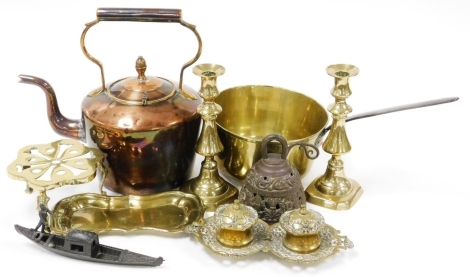 A group of brass and copper ware, to include copper kettle, brass pan, brass candlesticks, trivet, double ink stand, cast metal Venetian gondola with figure, 22cm long, etc.