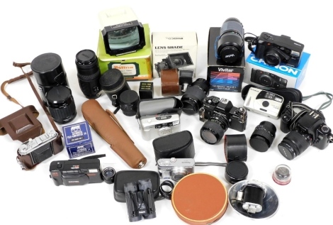 A group of camera related equipment, to include a Canon EOS 1000F camera, a Praktica B100 camera, a Kodak Retina IA, with various lenses, to include a Praktica lens, a Sigma AF Zoom 55-200mm lens, etc. (a quantity)