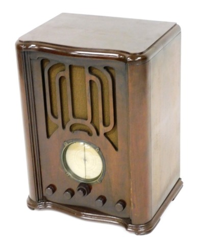 A Ferguson Radio Corporation Ltd oak cased radio, model number 378AC, 56cm high, 40cm wide, 30cm deep.