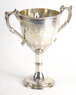 A Victorian silver trophy, with bright cut body, acanthus leaf handles, inverted stem and circular foot, marked By The Gentry And Tradesmen Of Branston On Approaching Marriage 1889, Sheffield 1877, 27cm high, 16oz. - 4