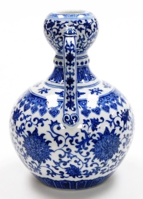 A fine Chinese blue and white porcelain vase, of bulbous shape with two handles, decorated with a band of formal scrolling peonies within bands of lappets, further scrolls and keyfret designs, the base with six character seal mark of Yongzheng period, but - 3