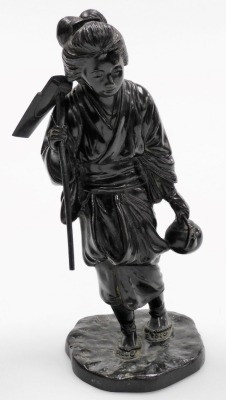 A pair of Japanese Meiji period bronze Tokyo School figures, of a lady holding a hoe and teapot, and man with pipe and tobacco pouch, four character signature of Genryusai Seiya to each base, each figure 26cm high, one hardwood base. - 8