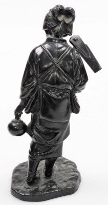 A pair of Japanese Meiji period bronze Tokyo School figures, of a lady holding a hoe and teapot, and man with pipe and tobacco pouch, four character signature of Genryusai Seiya to each base, each figure 26cm high, one hardwood base. - 10