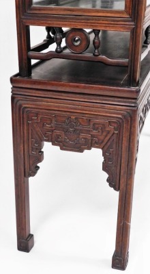 A Chinese hardwood glazed display cabinet, with various shelves raised on a platform stand with blind fret details, on square moulded legs, 93cm wide, 165cm high. - 3