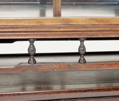 A Chinese hardwood glazed display cabinet, with various shelves raised on a platform stand with blind fret details, on square moulded legs, 93cm wide, 165cm high. - 7
