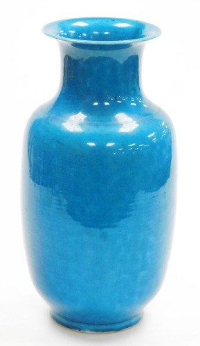 A Chinese turquoise blue porcelain vase, of shouldered ovoid form with a flared rim, 35cm high.