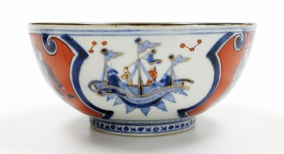 A Japanese porcelain Imari bowl, with wavy rim, painted with panels of storks and bats, 18.5cm diameter, and another Imari bowl decorated with three masted ships and Dutchmen, 18.5cm diameter. - 6