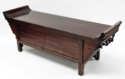 A Chinese stained wood writing table, carved with scrolling prunus blossom fret work, having a pair of central doors, flanked by two small drawers, 34cm high, 92cm wide, 17.5cm deep. - 4