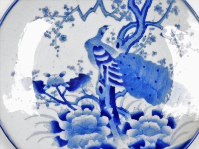 A Japanese blue and white charger, depicting peacock and flowering tree branch, 46cm diameter. - 2