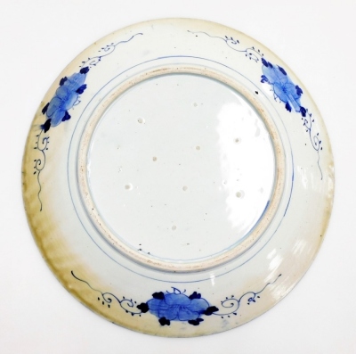 A Japanese blue and white charger, depicting peacock and flowering tree branch, 46cm diameter. - 3