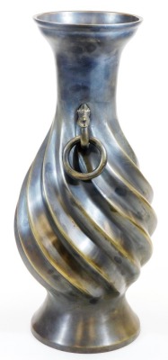 A large Japanese bronze vase, the body with relief spiral twist and loose ring animal head handles, Taisho period, 48cm high. - 2