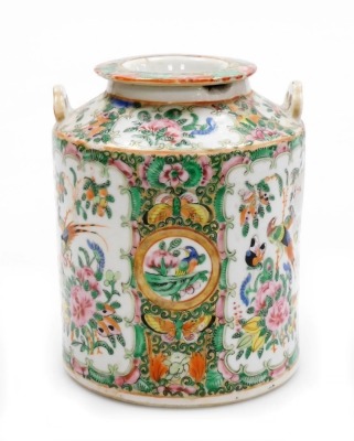 A 19thC Chinese Canton porcelain famille rose cannister and cover, decorated with reserves of birds, butterflies, and flowers, with two raised fittings for wire handles, 17cm high. (AF)