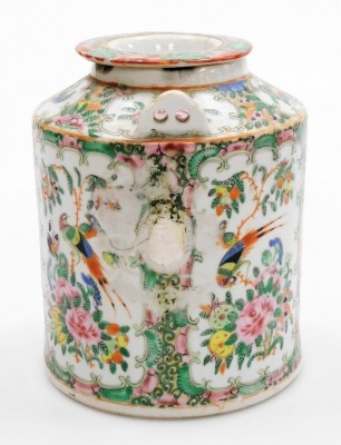 A 19thC Chinese Canton porcelain famille rose cannister and cover, decorated with reserves of birds, butterflies, and flowers, with two raised fittings for wire handles, 17cm high. (AF) - 2