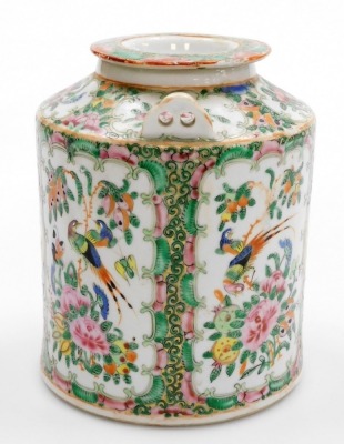 A 19thC Chinese Canton porcelain famille rose cannister and cover, decorated with reserves of birds, butterflies, and flowers, with two raised fittings for wire handles, 17cm high. (AF) - 4