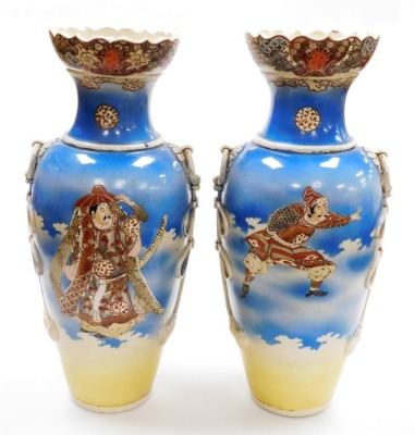 A pair of Japanese Meji period ovoid vases, with foliate rims and applied ring handles, with painted figures of Samurai on a sprayed blue and yellow ground, 54.4cm high. - 3