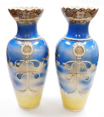 A pair of Japanese Meji period ovoid vases, with foliate rims and applied ring handles, with painted figures of Samurai on a sprayed blue and yellow ground, 54.4cm high. - 4