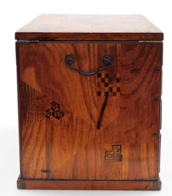 A Japanese Meiji period metamorphic parquetry travelling writing desk, comprising two cabinets with seven drawers and carrying handles, the removable top forming the writing surface when assembled, dimensions (when closed) 25cm high, 32.5cm wide, 22cm dee - 3