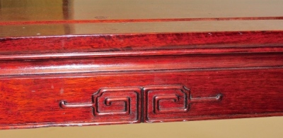 A Chinese hardwood coffee table, 41cm high, the top 50cm x 127cm. - 2