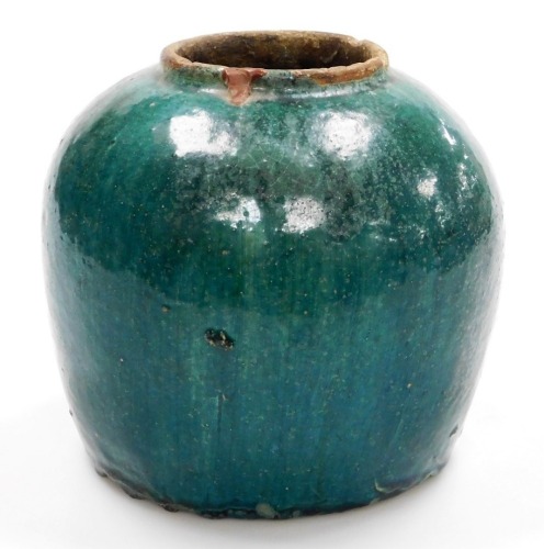 A Chinese earthenware green crackle glaze jar, of bulbous form, 23cm high.