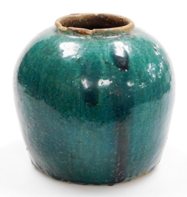 A Chinese earthenware green crackle glaze jar, of bulbous form, 23cm high. - 2