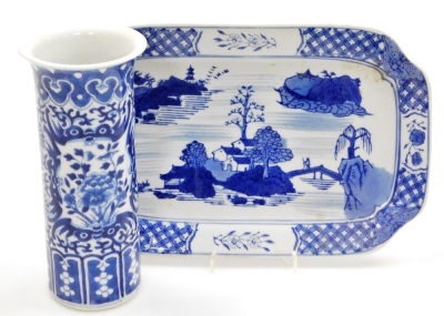 A Chinese blue and white cylindrical vase, with a flared rim, the body decorated with reserves of flowers and birds, 20cm high, and a modern Chinese oblong dish, decorated with houses and trees, within a floral decorated and hatched border, 29cm wide, 'ma