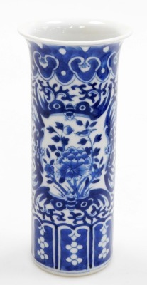 A Chinese blue and white cylindrical vase, with a flared rim, the body decorated with reserves of flowers and birds, 20cm high, and a modern Chinese oblong dish, decorated with houses and trees, within a floral decorated and hatched border, 29cm wide, 'ma - 4