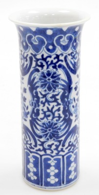 A Chinese blue and white cylindrical vase, with a flared rim, the body decorated with reserves of flowers and birds, 20cm high, and a modern Chinese oblong dish, decorated with houses and trees, within a floral decorated and hatched border, 29cm wide, 'ma - 5