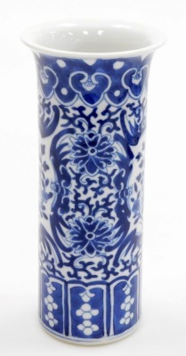 A Chinese blue and white cylindrical vase, with a flared rim, the body decorated with reserves of flowers and birds, 20cm high, and a modern Chinese oblong dish, decorated with houses and trees, within a floral decorated and hatched border, 29cm wide, 'ma - 7