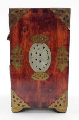 A Chinese hardwood jewellery casket, with brass handle and pierced mounts, carved simulated jade panels, the two hinged doors enclosing three drawers, above a further drawer to base, 22cm high, 15cm wide, 12cm deep, with lock and key. - 3