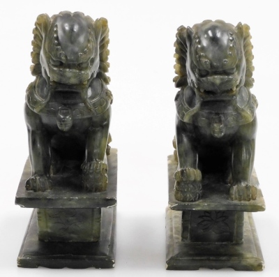 A pair of Chinese soapstone carved figures of dogs of fo, 18cm high. - 2