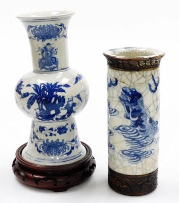 A group of Oriental wares, to include a blue and white vase with six character mark to underside, 22cm high, bowl with gilt highlights, 20cm diameter, metal baluster vase with gilt highlights, five character mark to underside, 14cm high, two hardwood base - 11