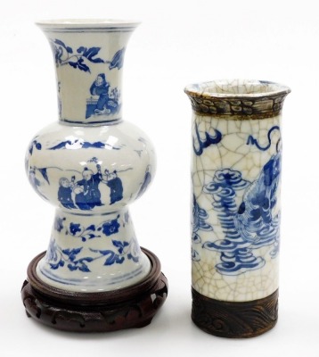 A group of Oriental wares, to include a blue and white vase with six character mark to underside, 22cm high, bowl with gilt highlights, 20cm diameter, metal baluster vase with gilt highlights, five character mark to underside, 14cm high, two hardwood base - 12