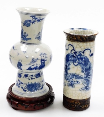 A group of Oriental wares, to include a blue and white vase with six character mark to underside, 22cm high, bowl with gilt highlights, 20cm diameter, metal baluster vase with gilt highlights, five character mark to underside, 14cm high, two hardwood base - 13