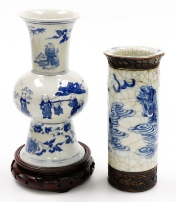 A group of Oriental wares, to include a blue and white vase with six character mark to underside, 22cm high, bowl with gilt highlights, 20cm diameter, metal baluster vase with gilt highlights, five character mark to underside, 14cm high, two hardwood base - 14